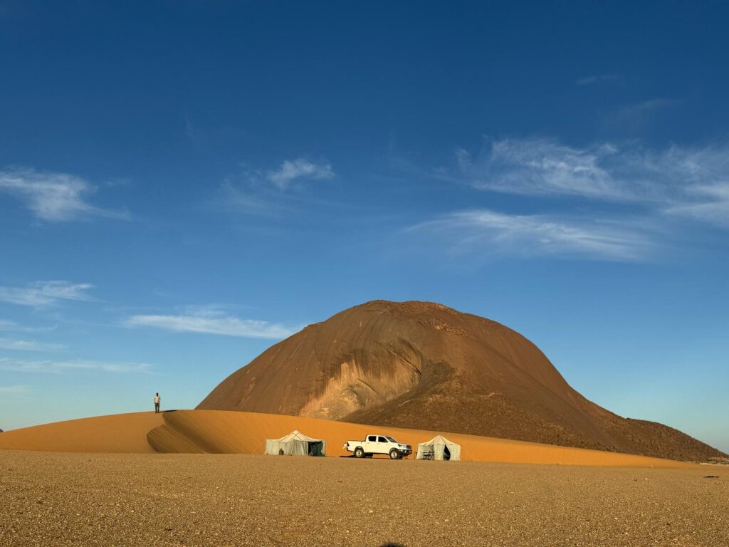 ben Amera dwarves a desert encampment