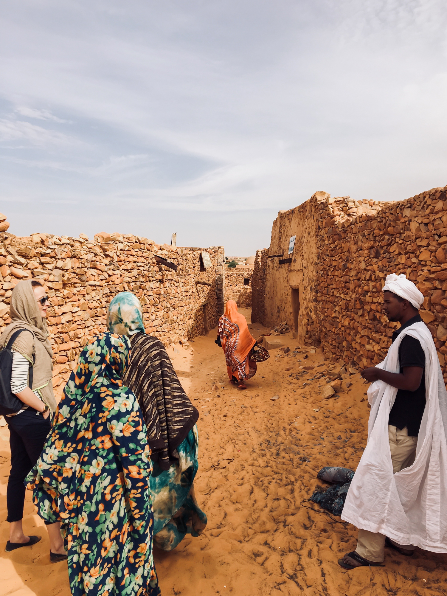 A group tour the ruins of Chinguetti